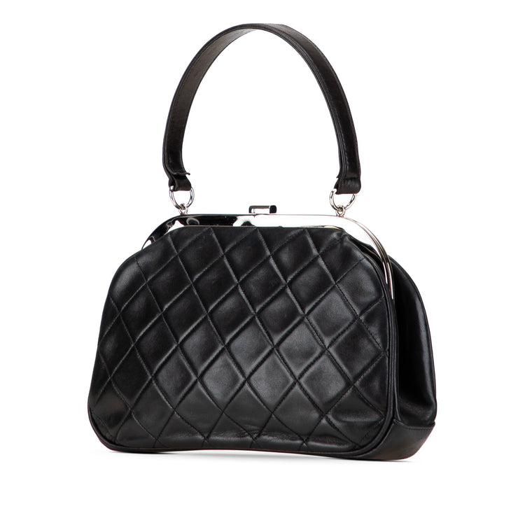 Vintage 1996 Chanel Kiss Lock Closure in Black