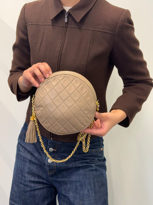 Vintage 1986 Chanel Beige Quilted Lambskin Round Tassel Chain Bag